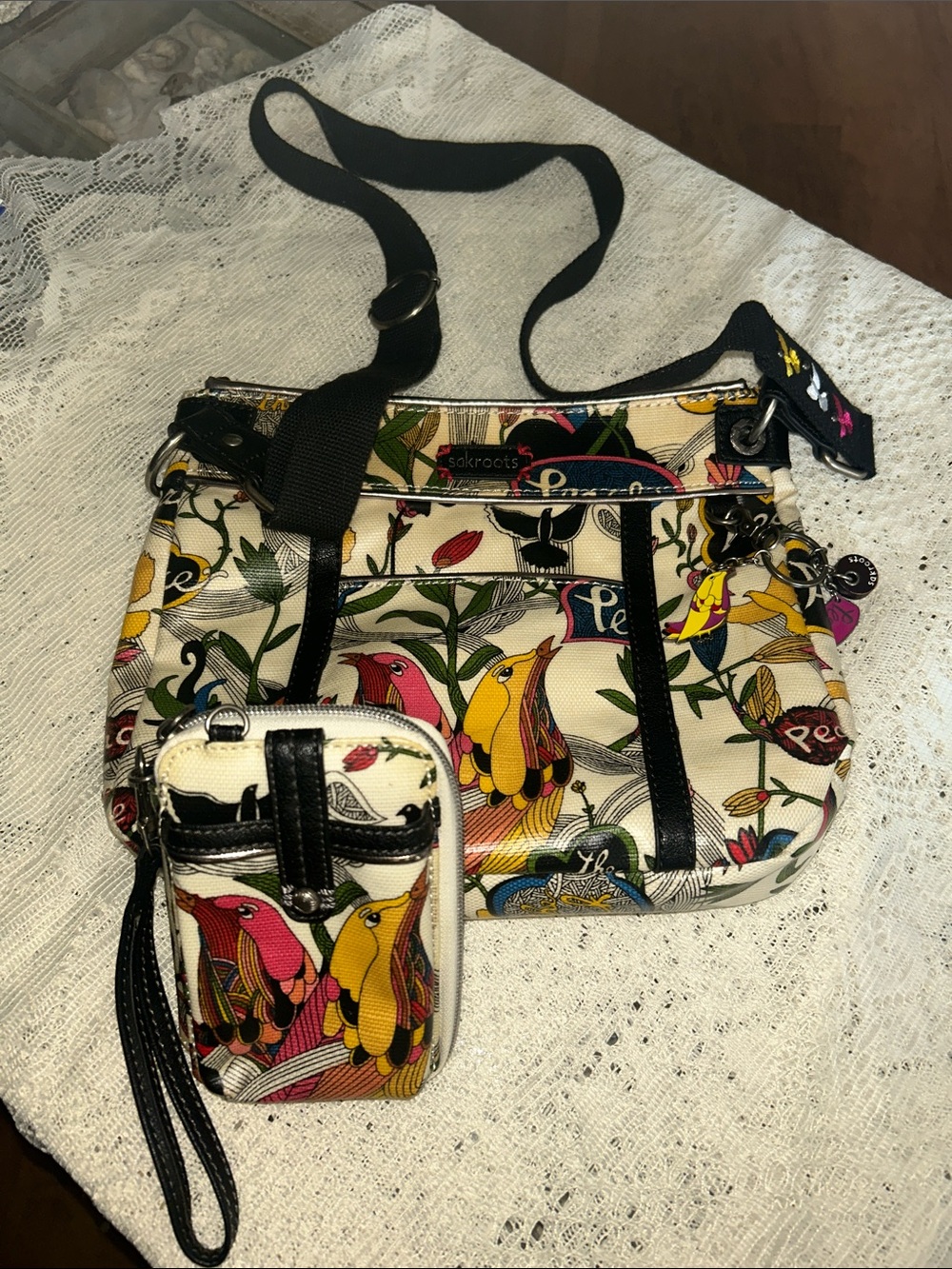 Sakroots Crossbodywith matchingWristlet with bird print